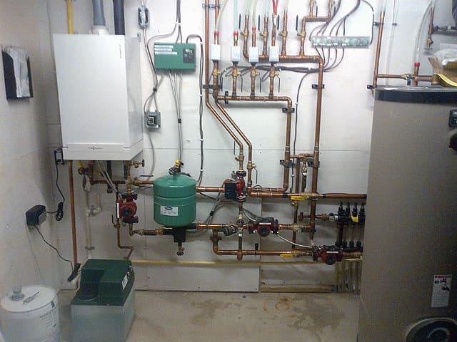 Completed mechanical install with manifold and indirect tank.