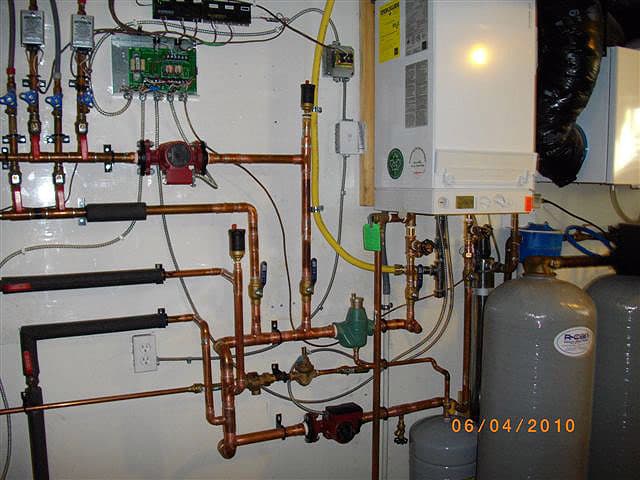 Viessmann Vitodens hydronic boiler installation in a Waterloo Region mechanical room.